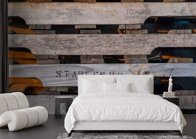 wooden pallets stacked on the farm, brown natural background Wall mural