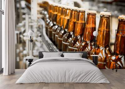 Beer bottles on the conveyor belt Wall mural