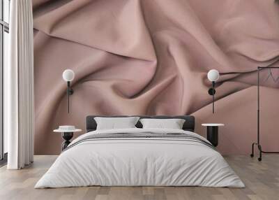 The texture of the fabric is cream-colored. Textile industry for the creation of clothing. Wall mural