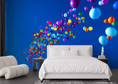 colorful balloons on a blue sky background Wall mural