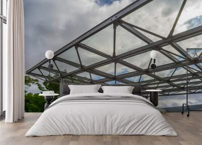 Dach Wetterschutz als Flugdach aus Stahlkonstruktion und Glas - Roof weather protection as a flying roof made as a of steel construction and glass Wall mural