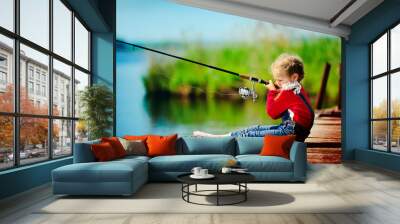 little girl fishing from wooden dock on lake Wall mural