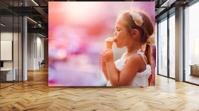 On seacoast the girl eats ice-cream Wall mural