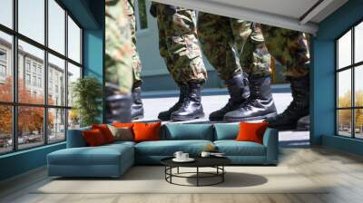 Military boots, soldiers standing in line Wall mural