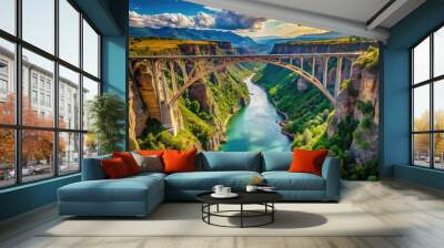 Breathtaking Aerial View Of A Towering Bridge Spanning A Rugged Canyon With Lush Greenery And Sparkling River Below. Wall mural