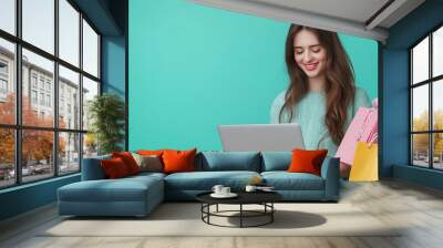 woman using laptop for online shopping Wall mural