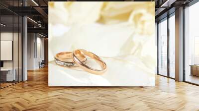 golden rings and  rose petals Wall mural