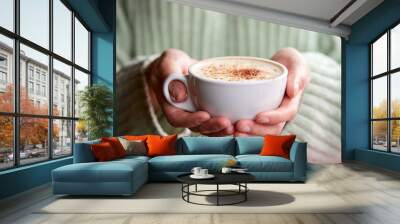 woman with cup of cappuccino Wall mural