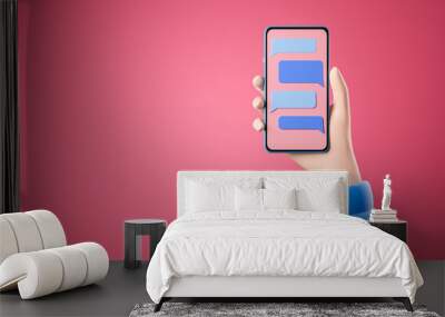 Cartoon hand in blue shirt holding smartphone with messenger window with blue chat boxes over pink background.  Social network and mobile communication concept. Wall mural