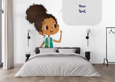 Young smiling African American girl scout dressed in uniform with badges and patches and speech bubble with place for text isolated on white background. Female scouter, member of troop, speaker. Wall mural