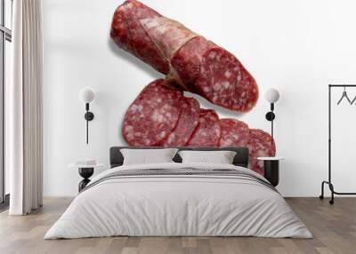 Salami cut with slices isolated Wall mural