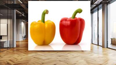 Two red and yellow bell peppers isolated on white Wall mural