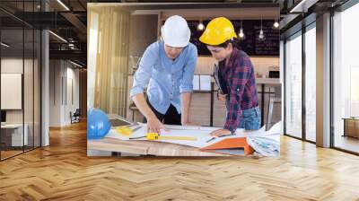 professional male and female engineers working and discuss with blueprint business together as teamwork Wall mural