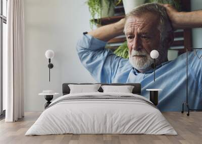 senior man thinking about business strategy as serious and stress at balcony Wall mural