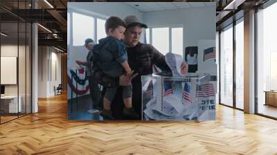 African American man and Caucasian man with child put ballots in box. Multiethnic American voters, people fill out bulletins in voting booths at polling station. Election Day in the USA. Democracy. Wall mural