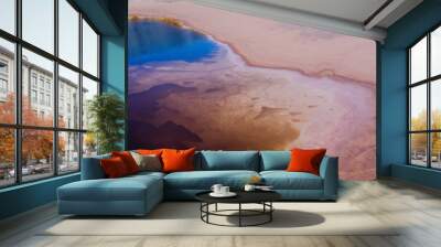 Aerial shot of the shore of a natural pond at Rio Tinto mining park in Spain Wall mural