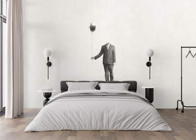 illustration of man without face holding black balloon with hat, surreal absence concept Wall mural