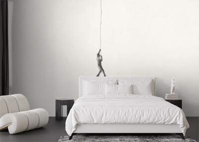 Illustration of minimal black and white man climbing a rope, abstract surreal concept Wall mural