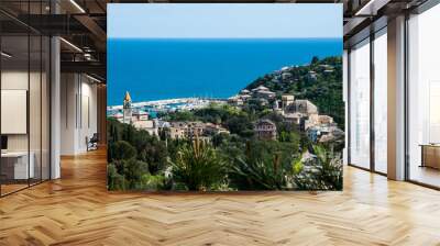 panorama of small town Arenzano in Liguria with its harbor and famous church 'Gesù Bambino di Praga' in the background Wall mural