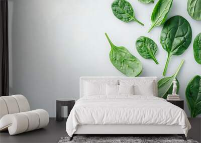 Crisp Green Spinach Displayed on a Pure White Background. Wall mural