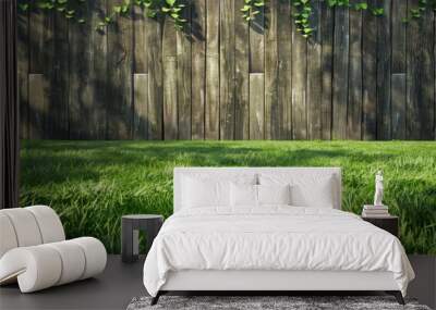 Fresh spring green grass and leaf plant over wood fence background Wall mural