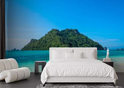 Scenics View of Tropical beach Against Sea and Blue Sky Wall mural