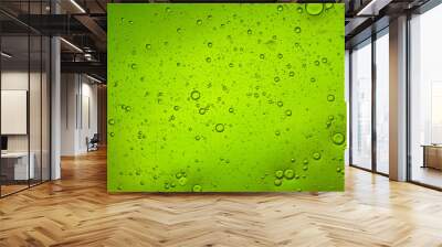 bright green liquid background of bubbles with movement Wall mural