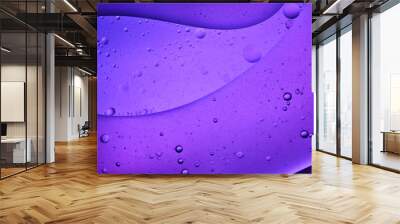 purple liquid background of bubbles with movement Wall mural