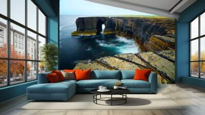 High cliff coastline on a foggy day in Westray, Orkney islands, Scotland Wall mural