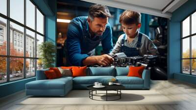 A man and a boy working on a car engine in the house garage Wall mural