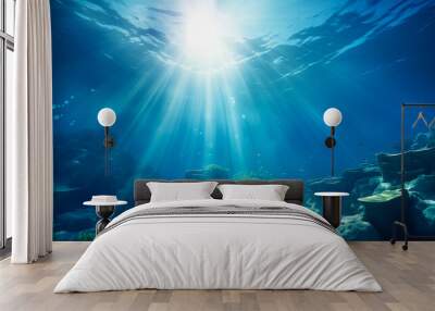 Underwater scene, beautiful blue ocean background with sunlight reflections and seabed Wall mural