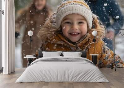 Happy child joyfully playing in the snow with parents in a winter forest on a snowy day Wall mural