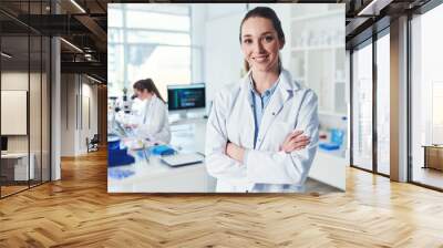 Portrait, scientist and confidence in science laboratory for medical research, biology and pharmaceuticals. Female person, arms crossed and technician in pathology, test or investigation for vaccine Wall mural