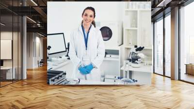 Science, research and portrait of woman in laboratory with smile for vaccine development in medical study. Biotech engineer, technician or confident scientist in office for pharmaceutical innovation Wall mural