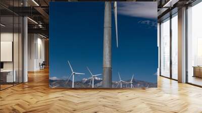 Old broken wind turbine in field of wind turbines Wall mural