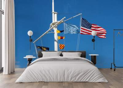 Nautical and American Flags Hanging from a Ship's Mast with Wisp Wall mural