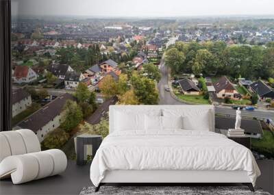 Suburban settlement in Germany with terraced houses, home for many families, aerial view with drone Wall mural