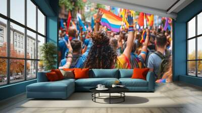 A pride parade with participants in colorful outfits, holding hands and waving flags, showcasing community and togetherness Wall mural