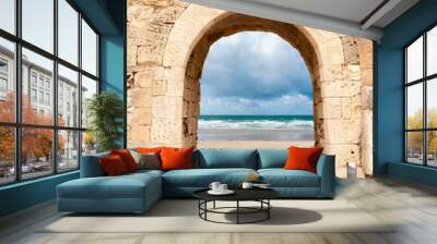 Archway leading to beach Wall mural