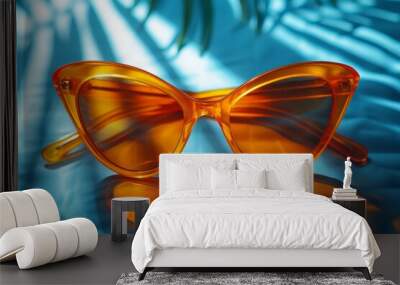 glamourous sunglasses on an orange background Wall mural