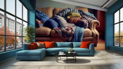 sofa with a huge pile of blankets in a cold room Wall mural