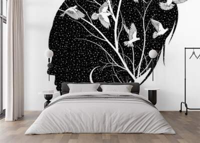 Silhouette of a female head with the night sky, moon, branches and birds Wall mural