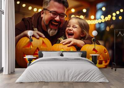 A father and children having fun while carving their halloween pumpkins Wall mural