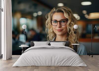 confident blonde woman professional in casual dress in an accounting office Wall mural