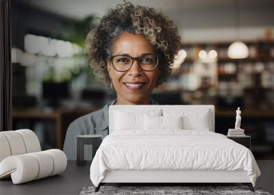 mature black woman professional in casual dress in an accounting office Wall mural