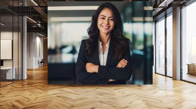 Portrait Indian female CEO smiling at the camera Wall mural