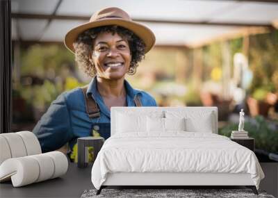 Portrait of a woman gardener at a community garden nurturing organic crops Wall mural