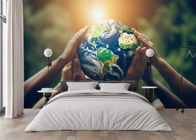 Saving the planet concept with multiple hands holding Planet Earth Globe above their head Wall mural