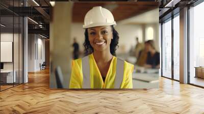 Smiling black female architect talking to her colleagues Wall mural