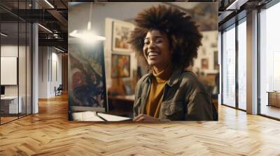 Smiling black female artist talking to her colleagues Wall mural